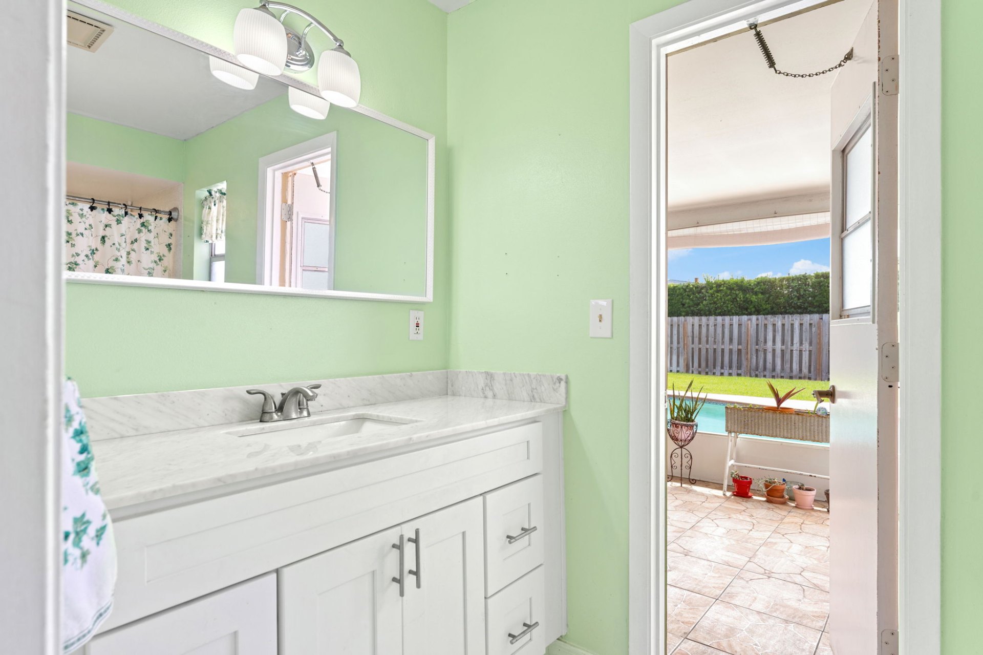 Primary bath with marble-top vanity
