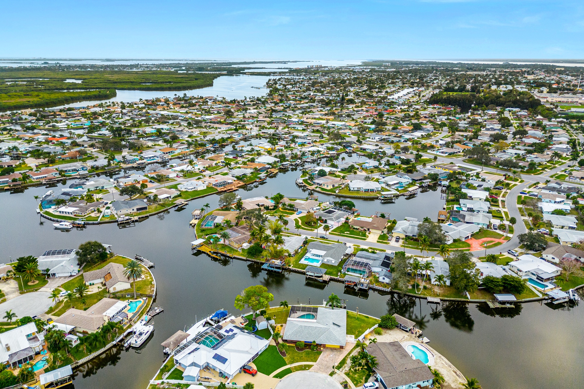 Aerial view of the Diana Shores canal-front neighborhood in Merritt Island, Florida